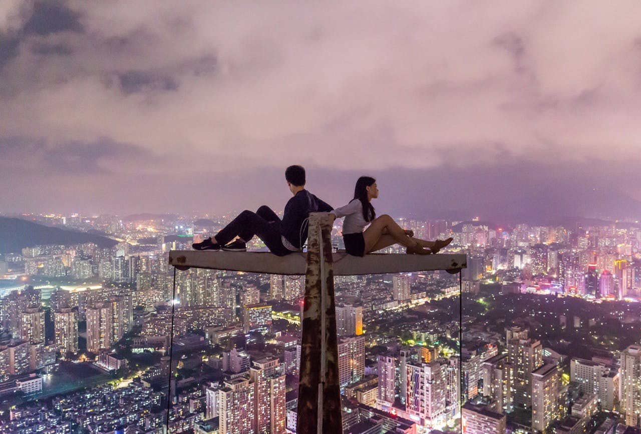 Couple on top of building