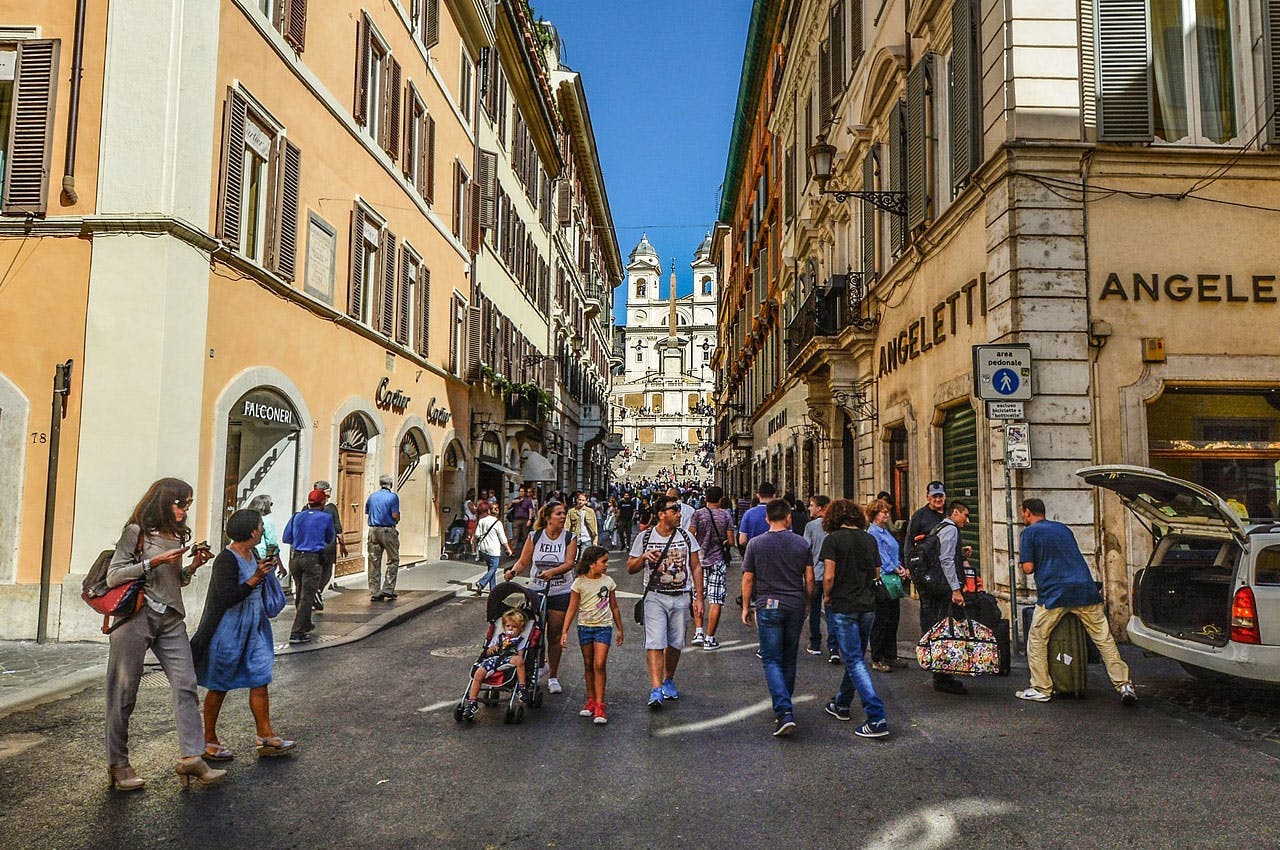People walking through the streets of Rome