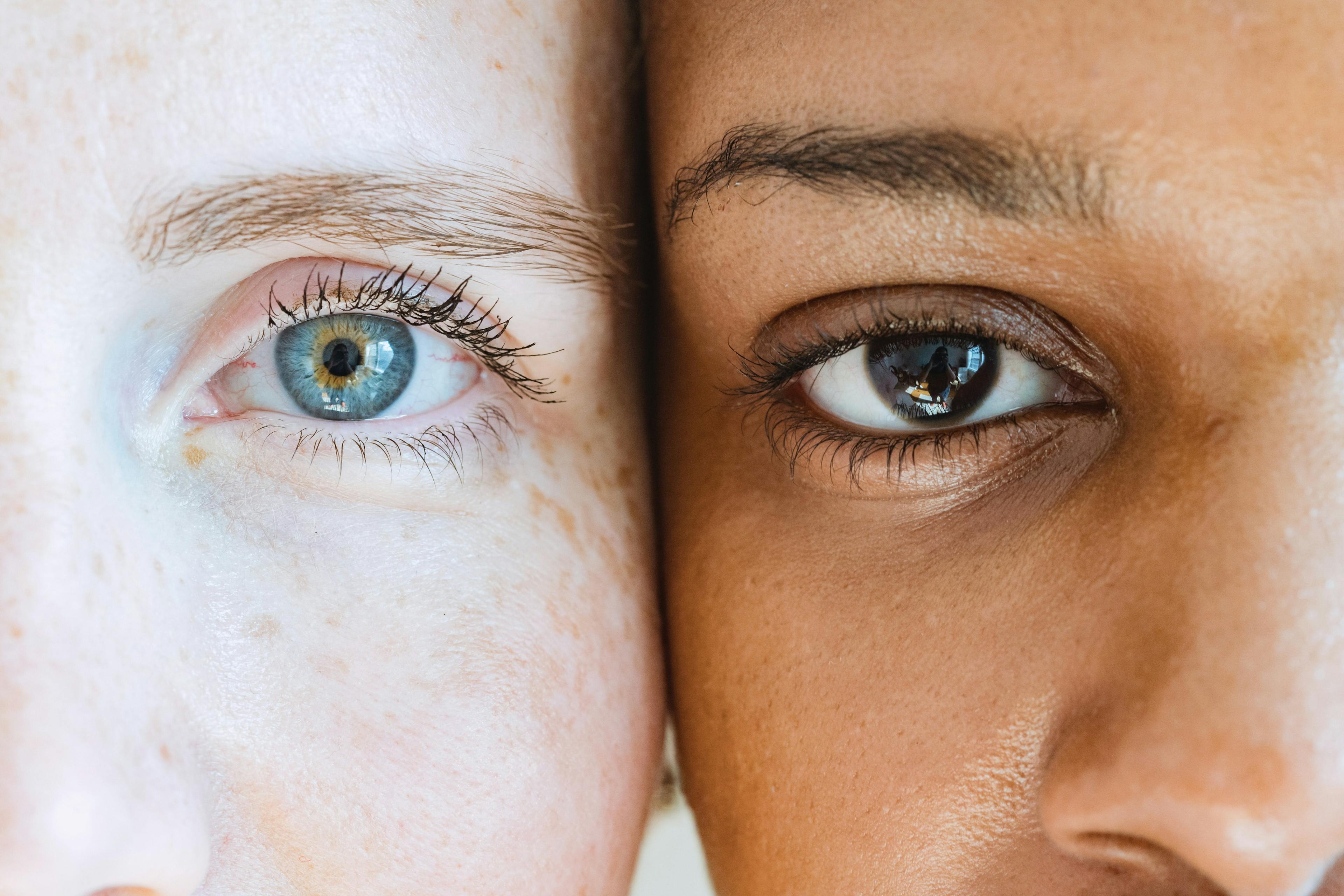split photo of a caucasian woman and an african american woman
