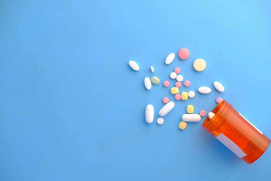 medicine and pills with blue bg