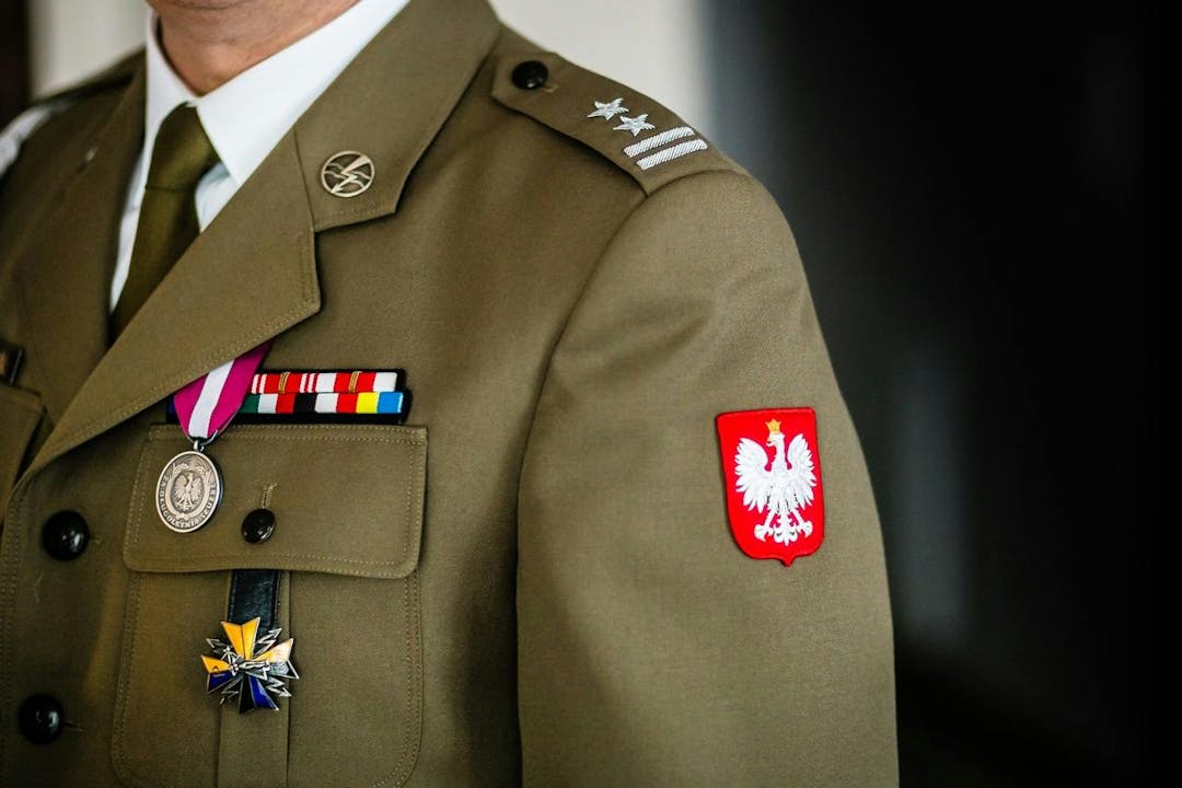 military uniform with Poland eagle patch
