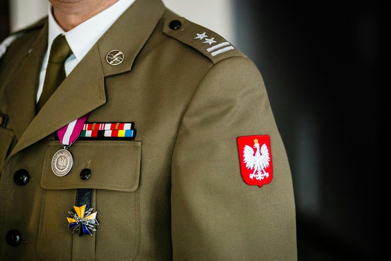 military uniform with Poland eagle patch
